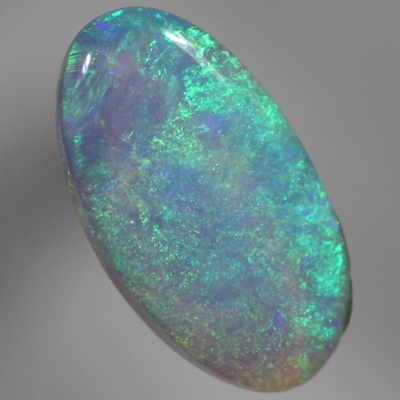 SOLID CRYSTAL OPAL Bright green fire plays in a 3D pattern throughout the opal